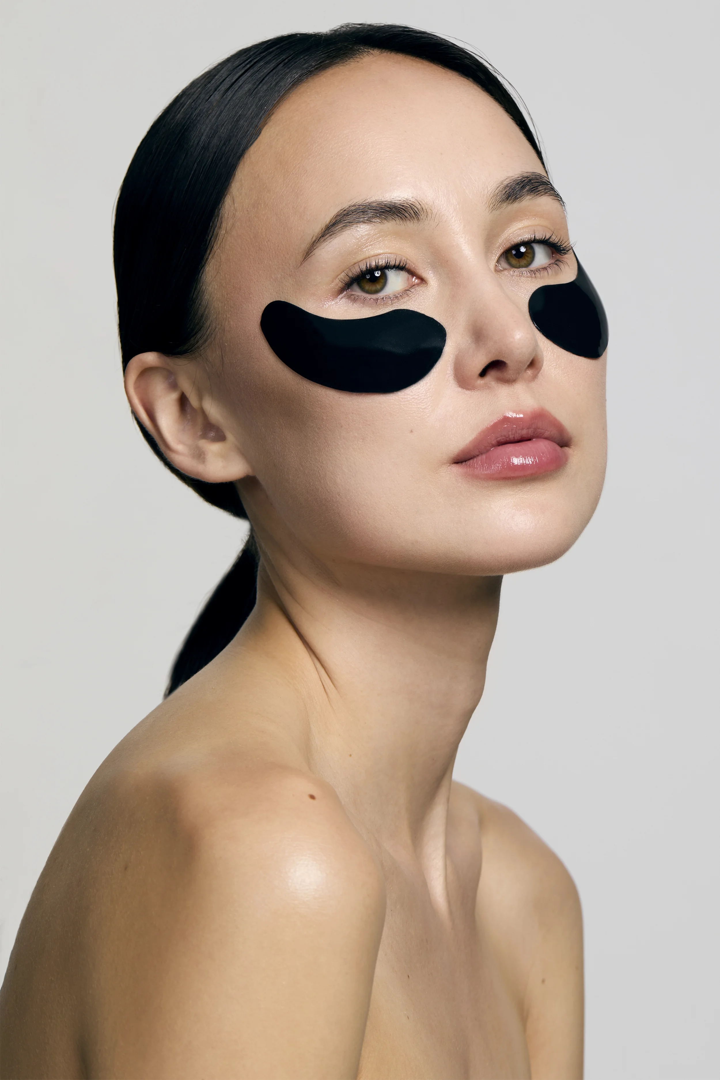  Model with under eye patches, skincare photoshoot, beauty photography, skincare photography, egle vasi, beauty photographer, beauty photographer london, beauty photographer, bristol 
