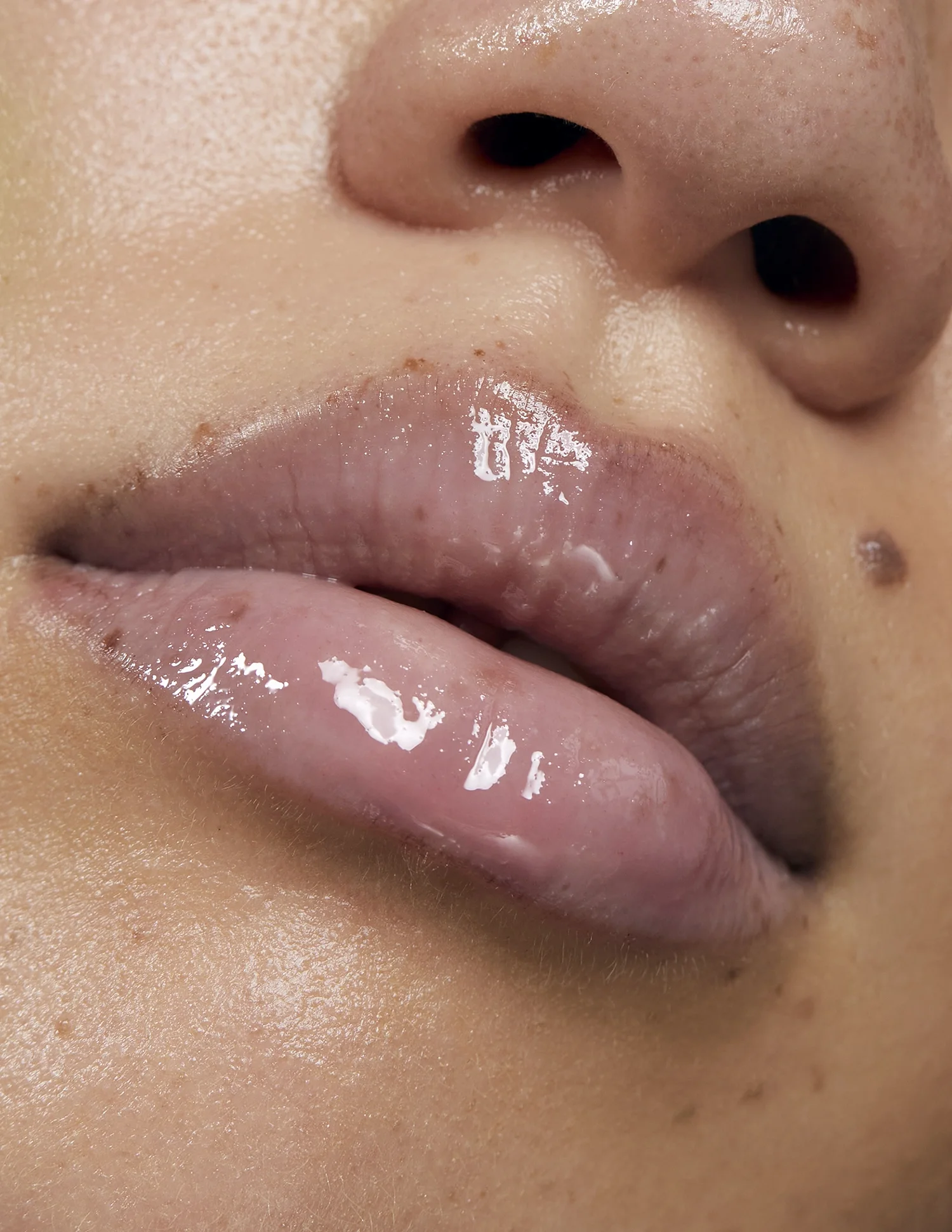  model with freckles and bold eyeliner, close up beauty, beauty photography 