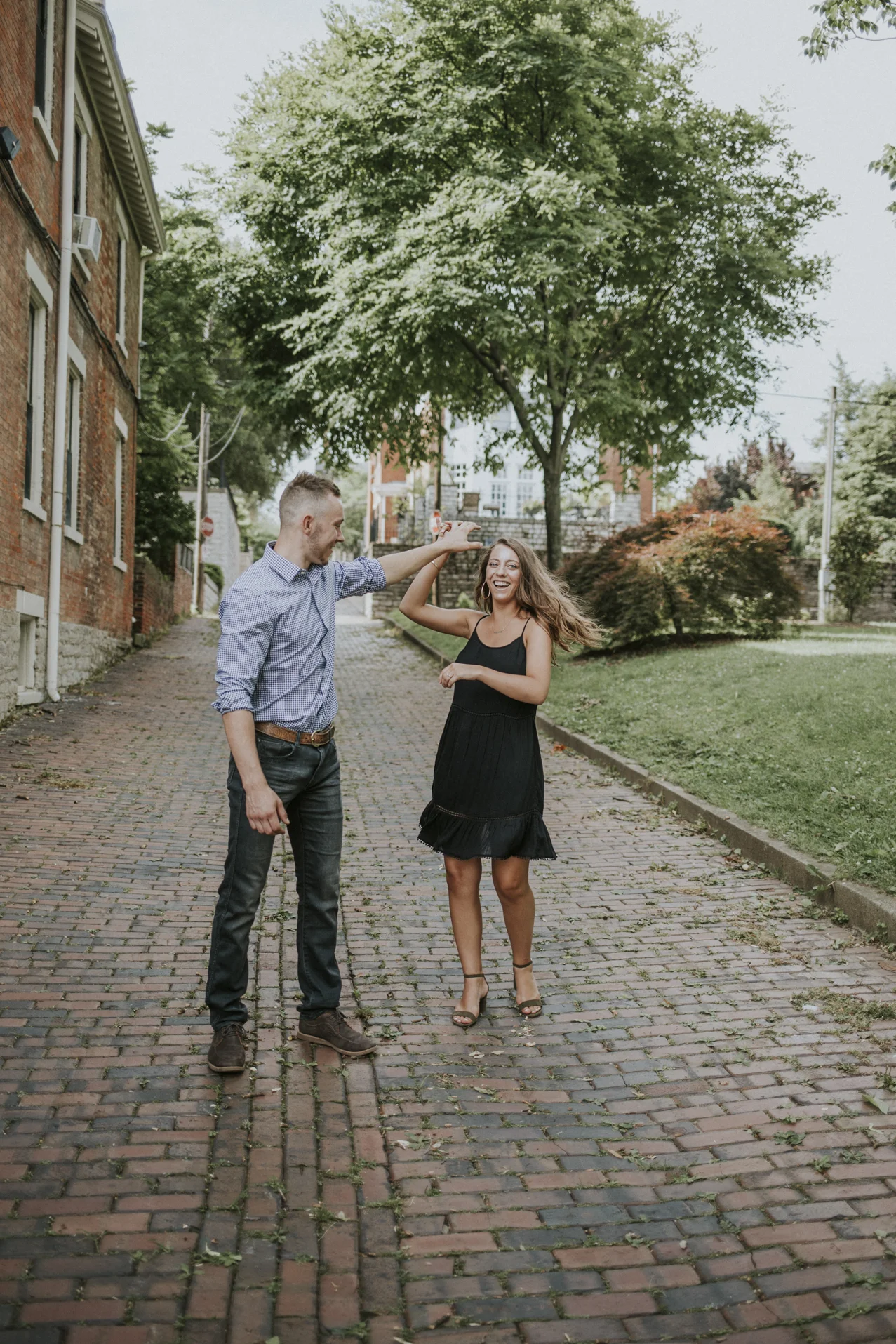 Avery and Noah Romantic Engagement Session in downtown Covington and French Park. Cincinnati Engagement Photography