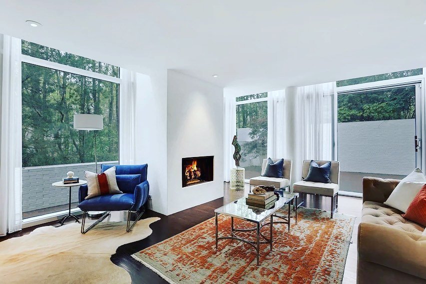 How amazing did this staging design turn out?! This was a modern home, but the seller wanted to warm up the space with the design and add in an art deco feel. This was a tricky floor plan to manage, factoring in an existing tv, plaster walls (prevent