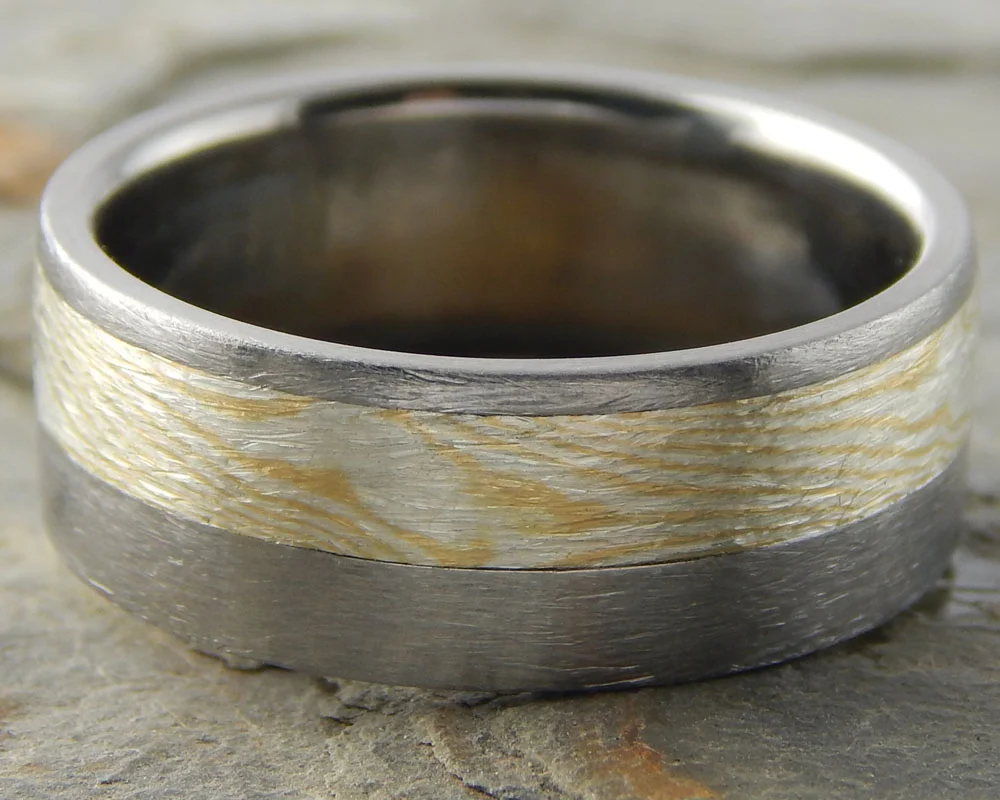 Woodgrain - 18k yellow gold offset inlay into titanium