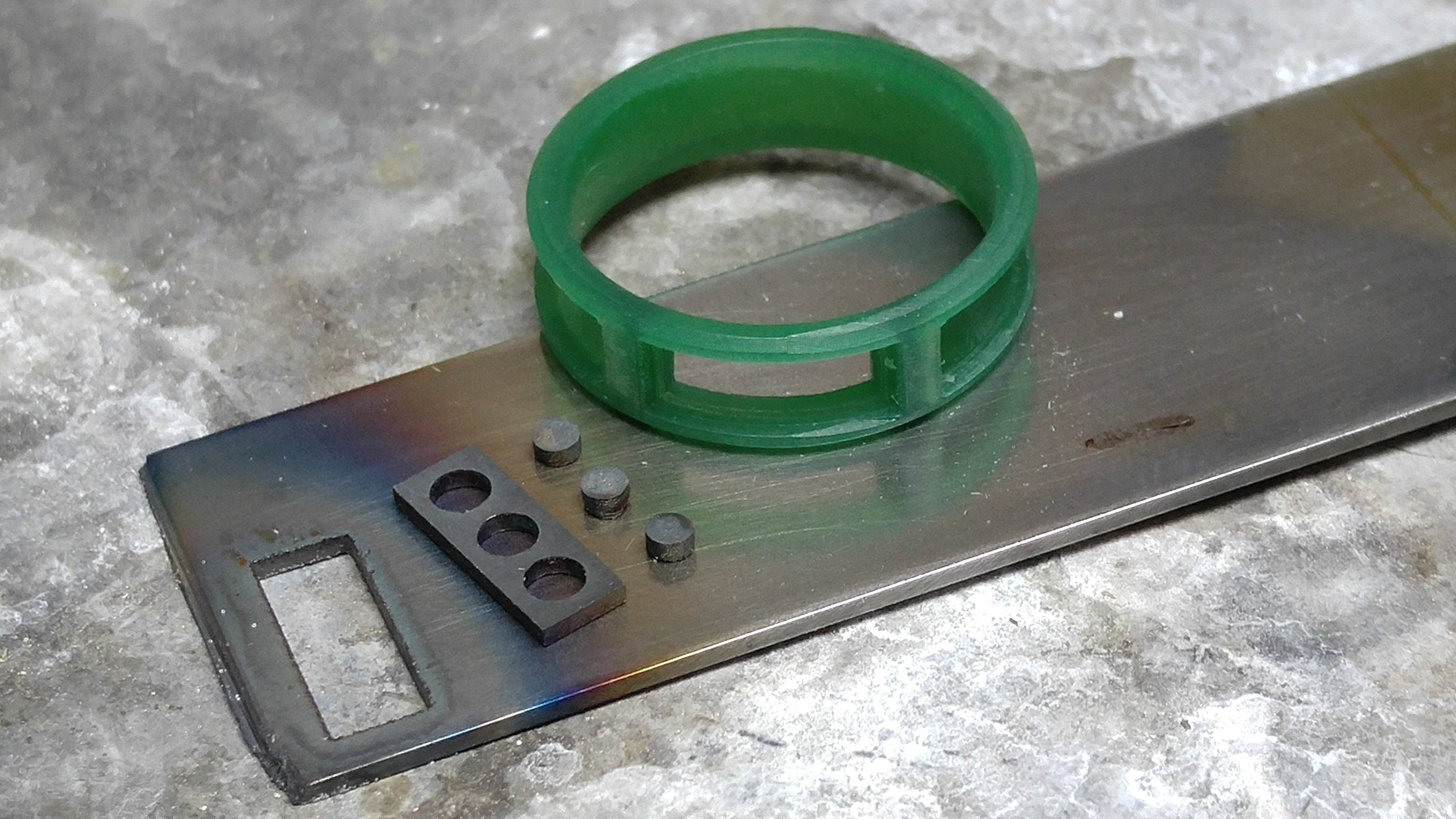 Laser cut meteorite going test fitting into a custom prototype.