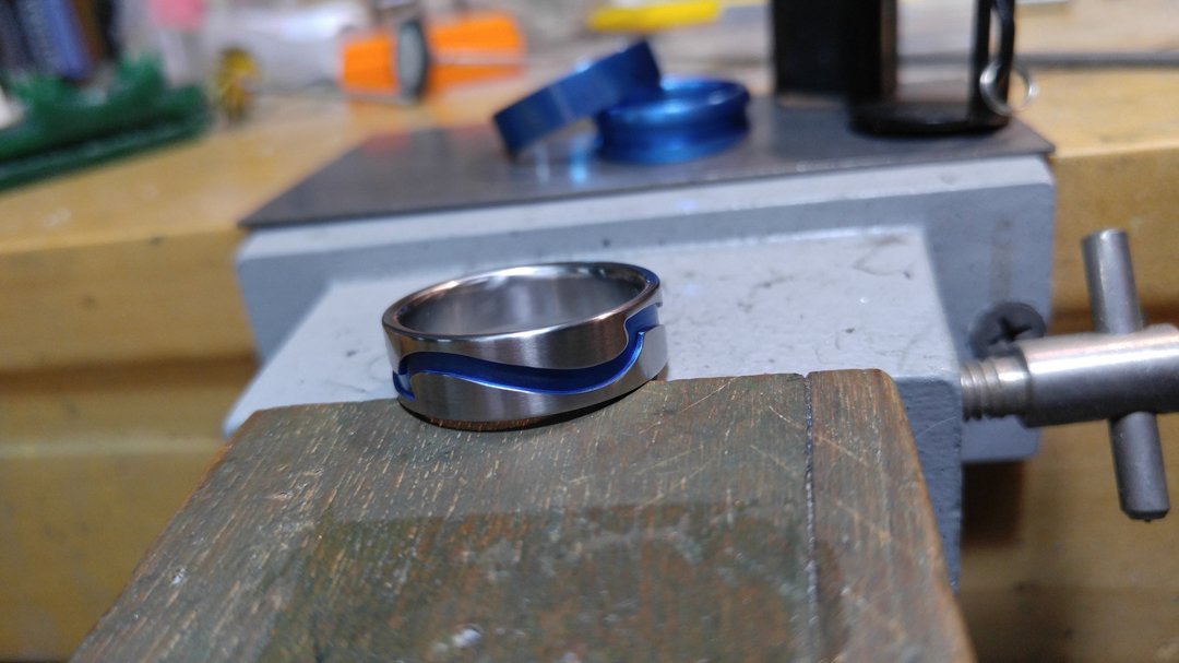 darvier-blue-anodized-titanium-wave-ring.jpg