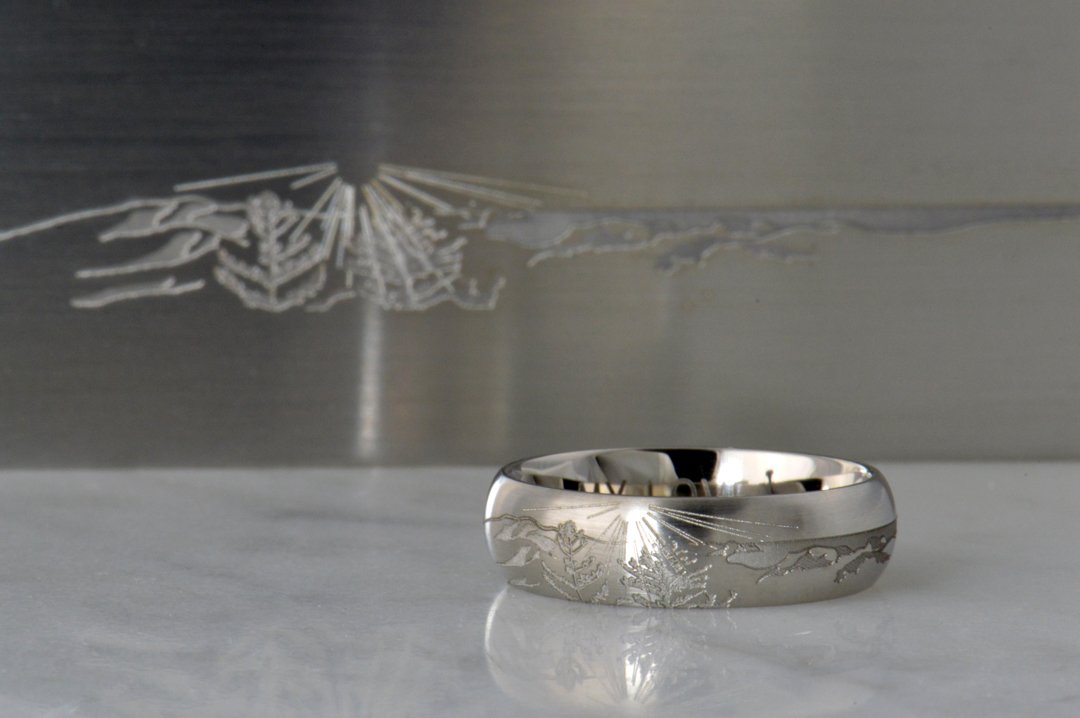 darvier-sunburst-engraved-palladium-wedding-ring.jpg