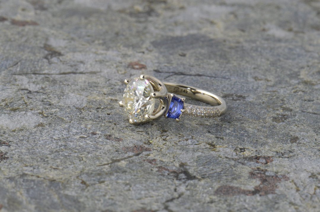 darvier-trapezoid-sapphire-three-stone-pave-ring.jpg