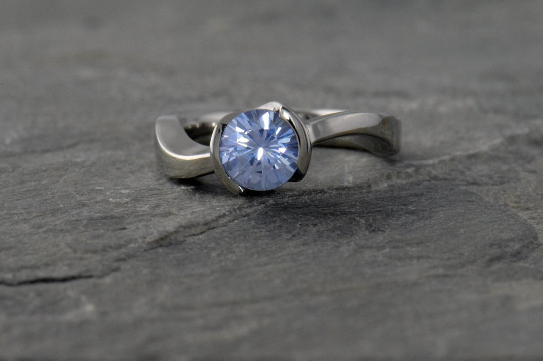 darvier-montana-sapphire-bezel-set-twist-engagement-ring.jpg