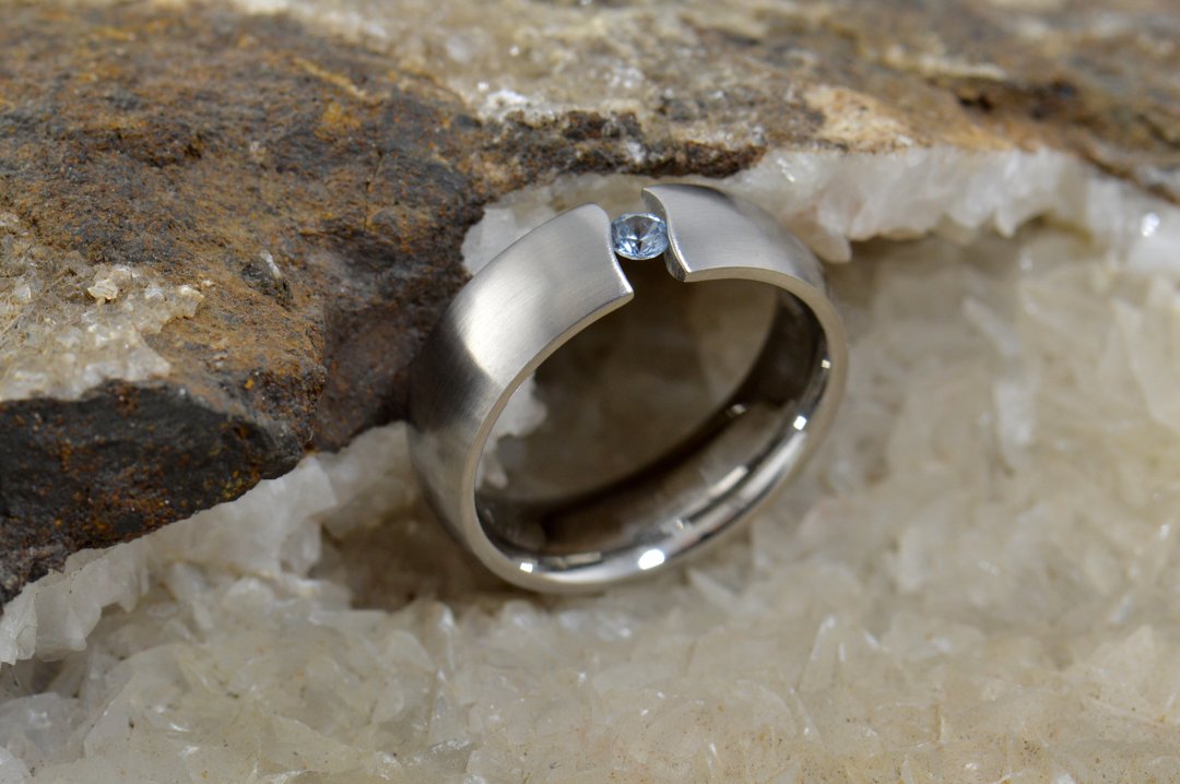 darvier-wavy-tension-set-sapphire-ring.jpg