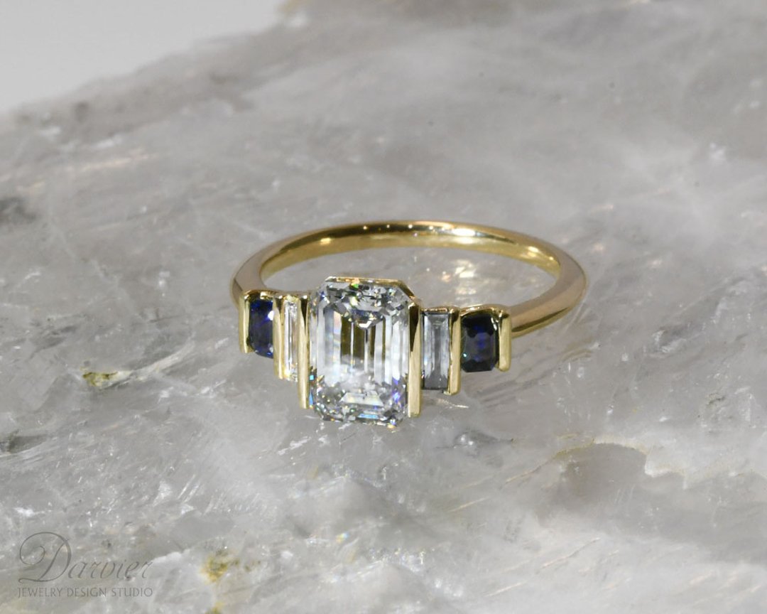 darvier-yellow-gold-wall-mounted-diamond-baguette-sapphire-engagement-ring.jpg