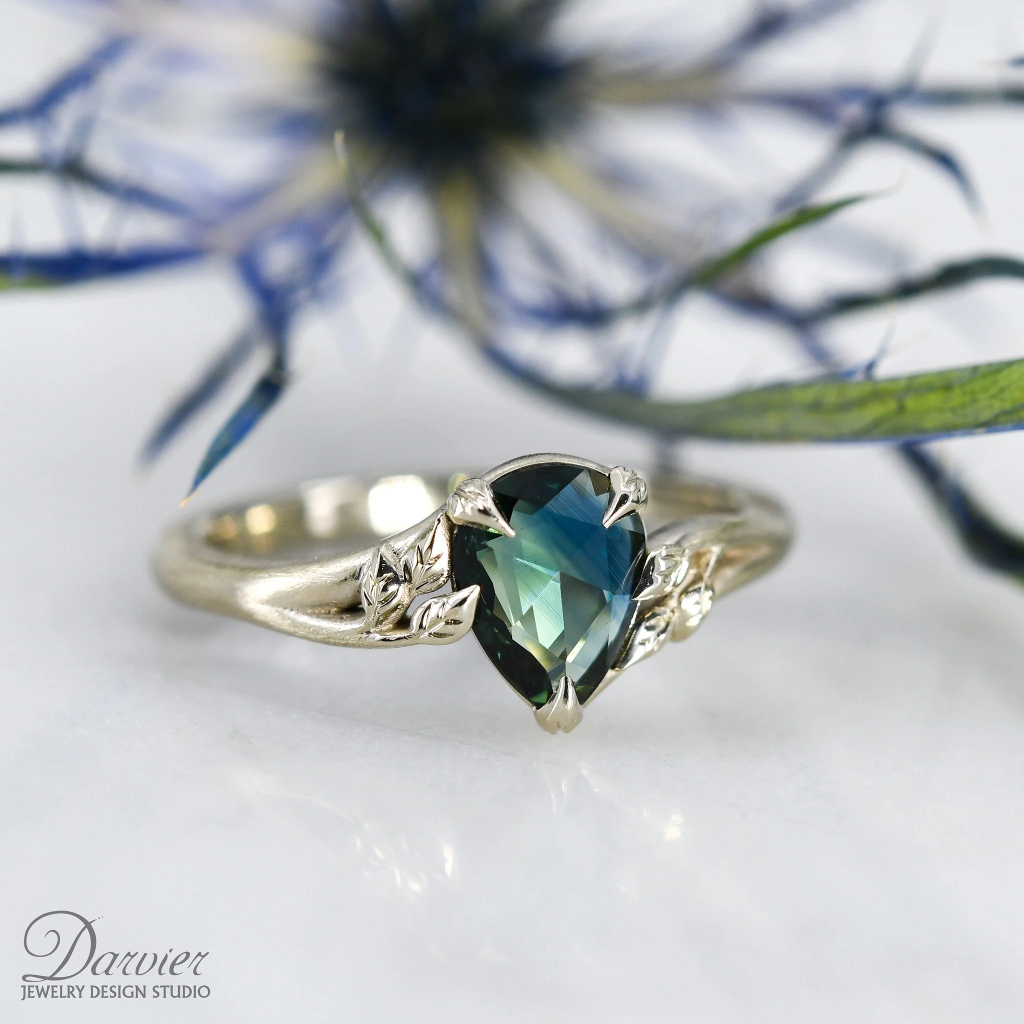 I can't stop staring, so I figured I&rsquo;d invite y&rsquo;all to join me 👀  There is something so poetic about this pear rose-cut natural sapphire from @misfitsapphires. We nestled it in delicate, leafy white gold prongs for a look that feels like