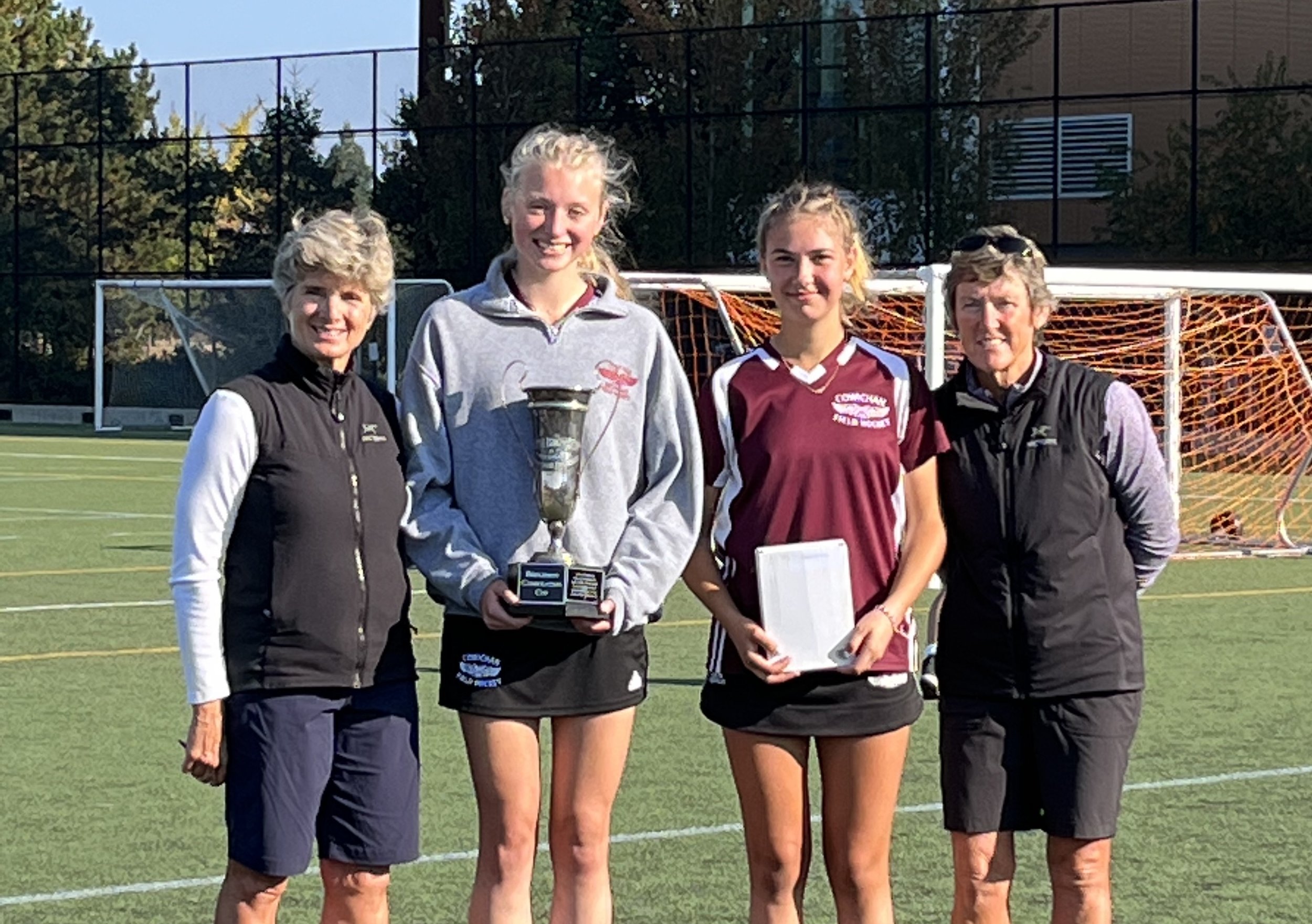  2022 Consolation Champions: Cowichan Secondary. Captains presented with Nancy Mollenhauer, Carrie Trumpy 
