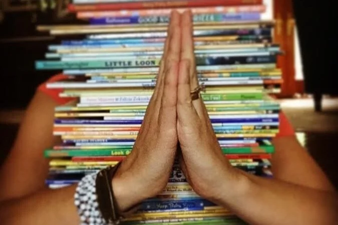 prayer-pose-with-books.jpg