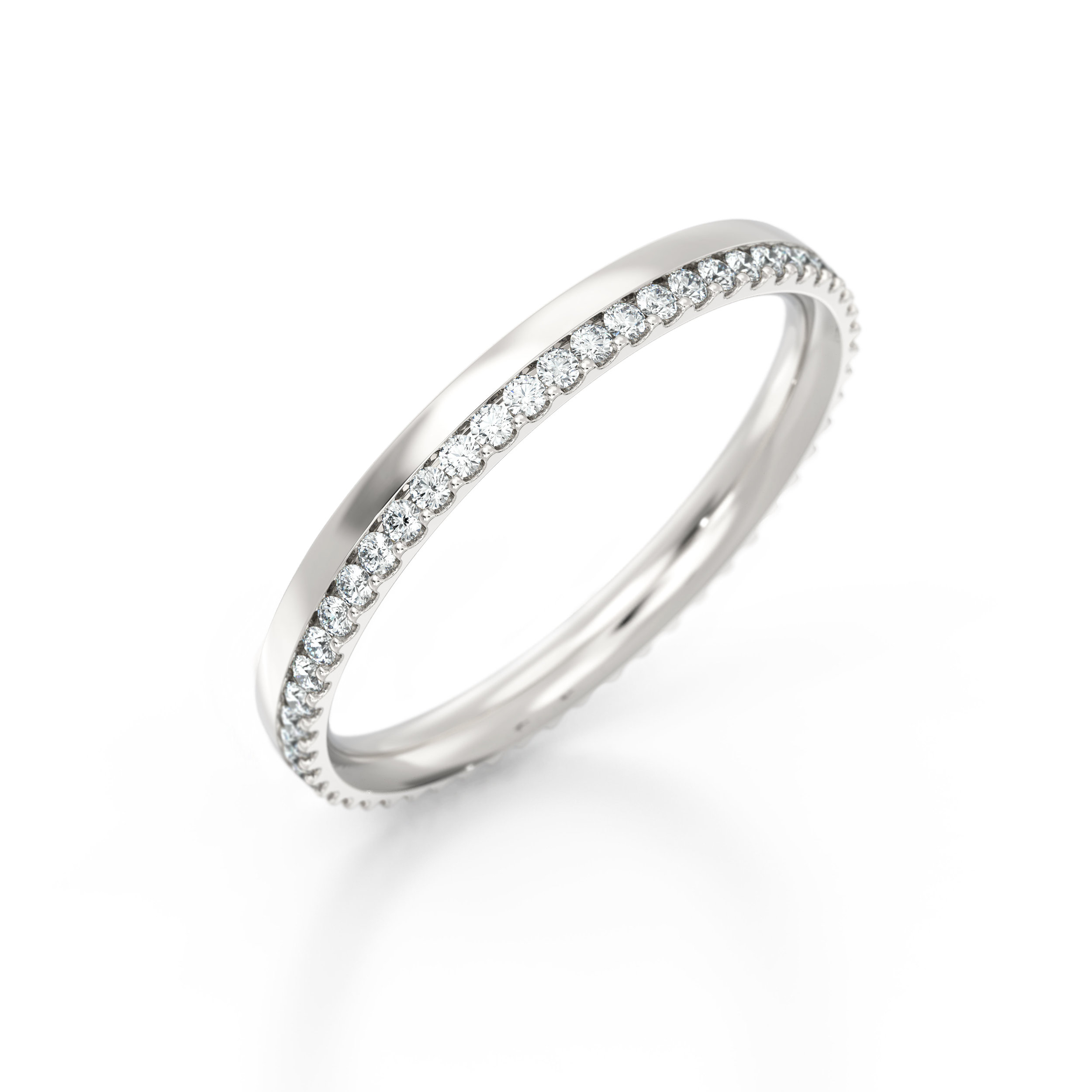 Off-set shared claw diamond eternity ring | Hatton Garden