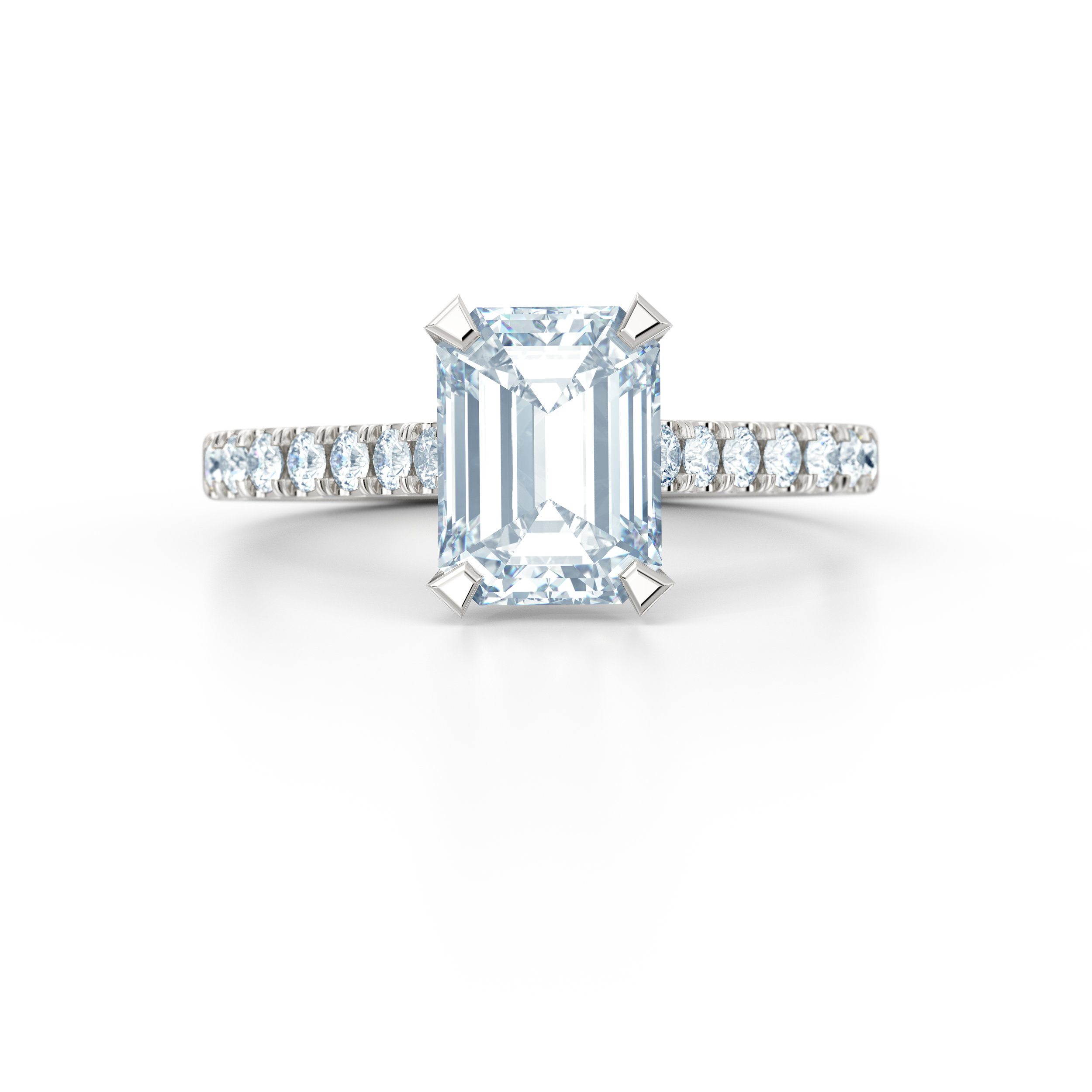 Emerald cut diamond shoulder engagement ring