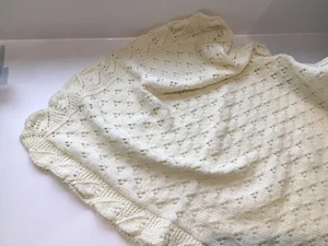 Hand knitted baby shawl hotsell