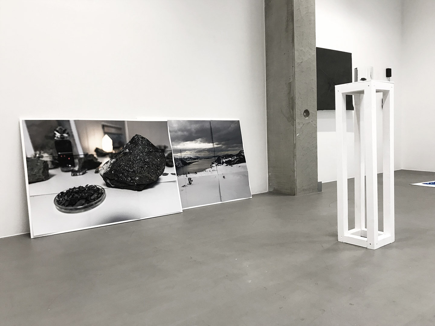   Remedium (2019)     Exhibited at ROM61, KMD, Bergen  Two images sliced into 9 pieces, 6-edge nut, hole puncher, wood. 120 x 88 cm. (x 2). Pedestal, glass dome, magnifier, rutile mineral sample. 150 x 20 x 20 cm. 