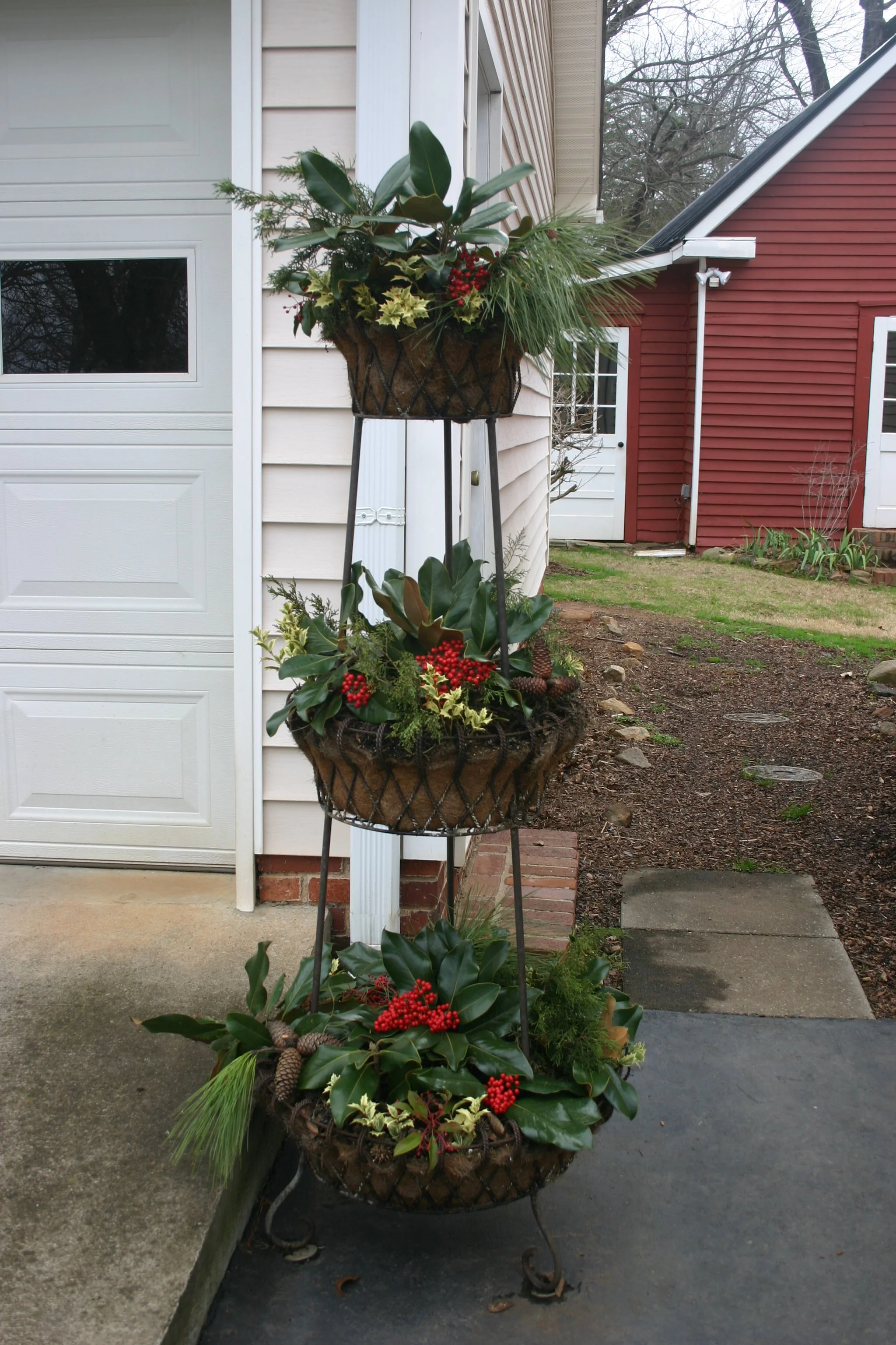 Triple tier with cut Christmas greenery
