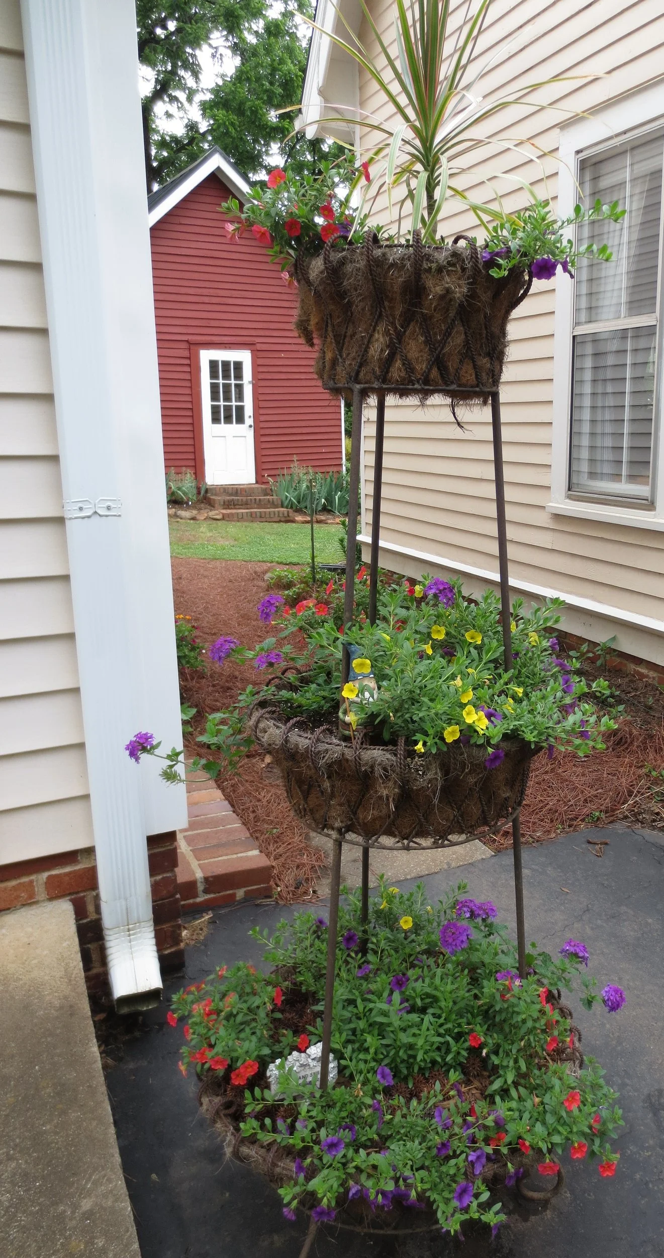 Triple tier planted in primary colors