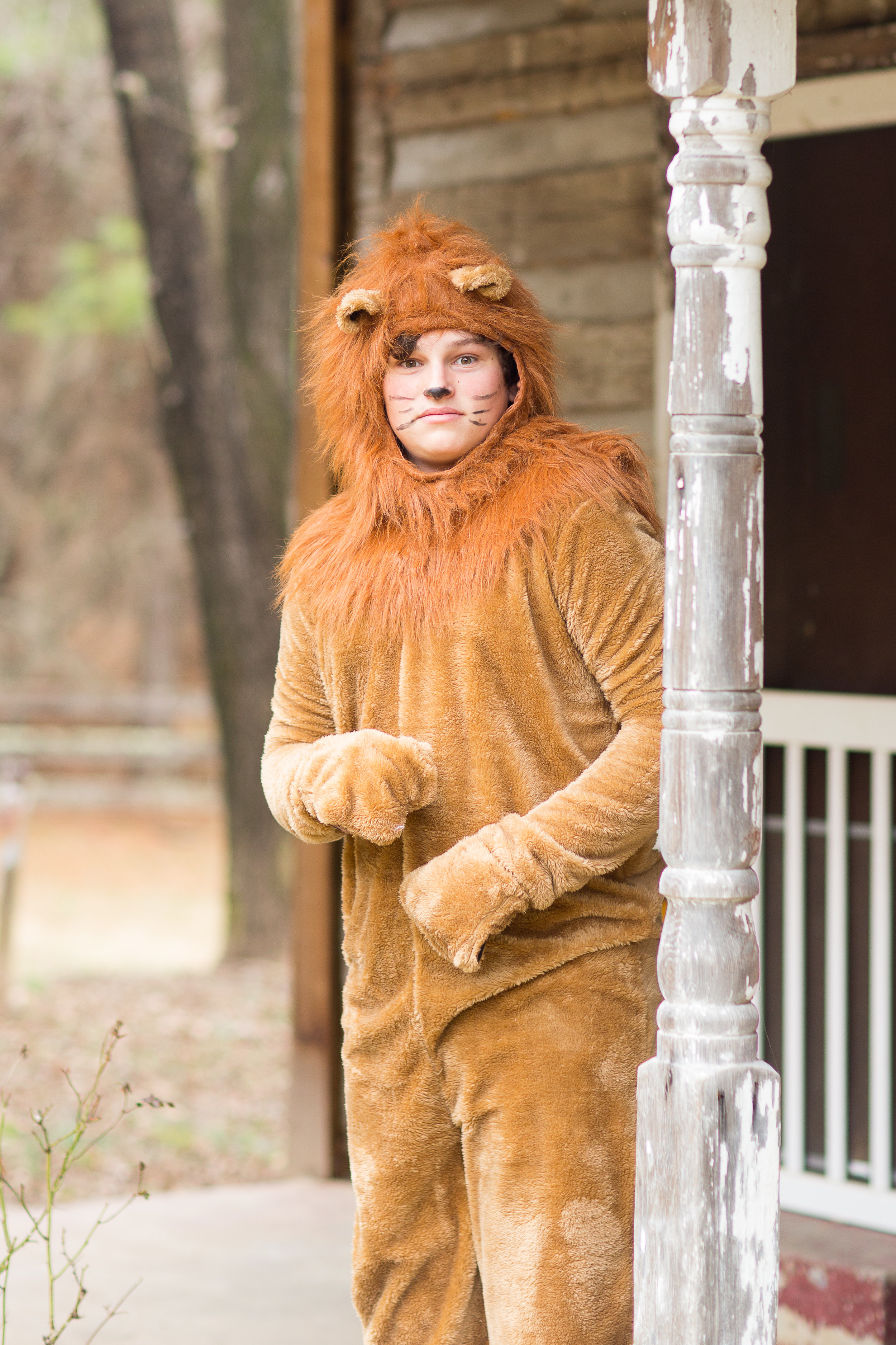 Cole Larsen as the Cowardly Lion