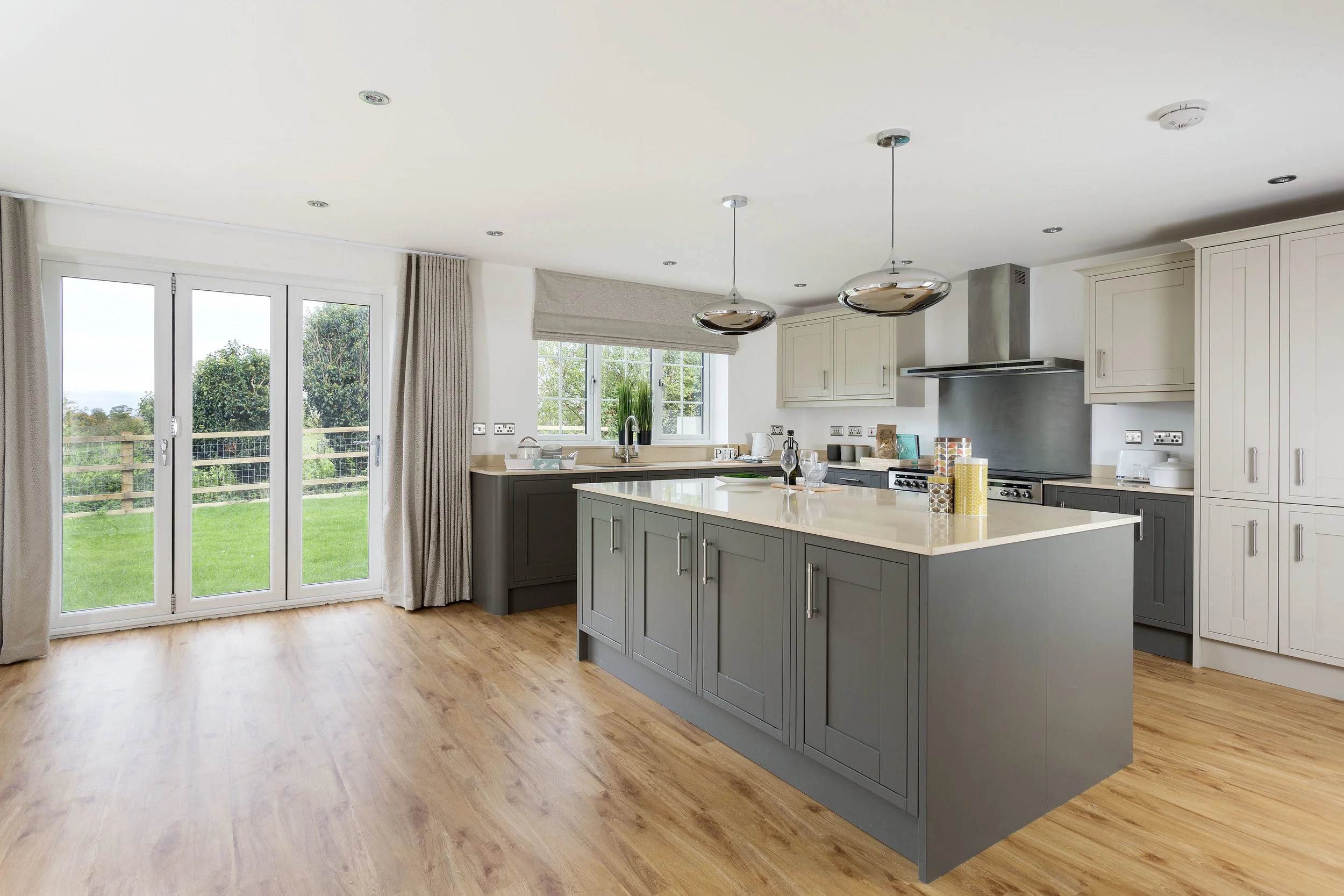 image of the kitchen of a house, overlooking the rural countryside beyond