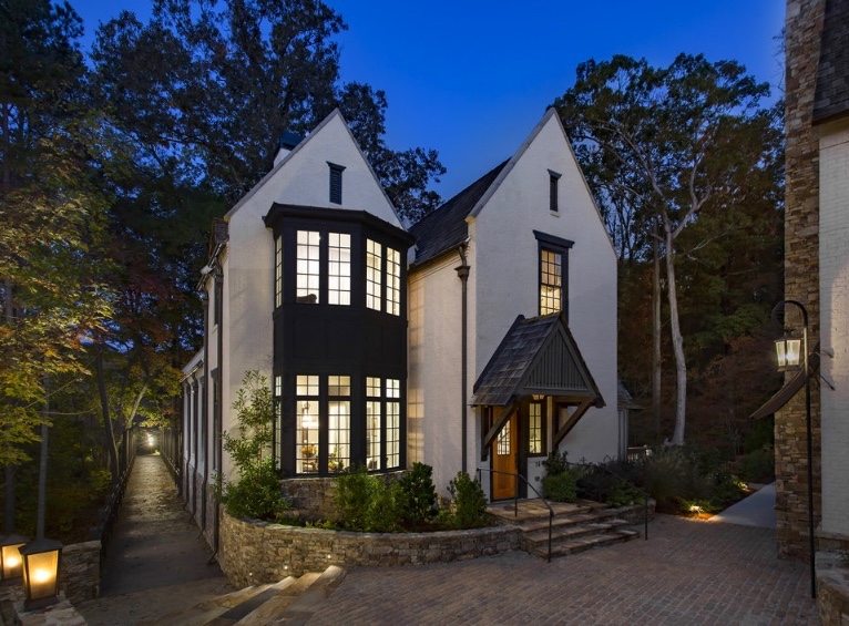 Designed for people not cars, a lantern-lit footbridge connects retail to the Swann Ridge residences. 