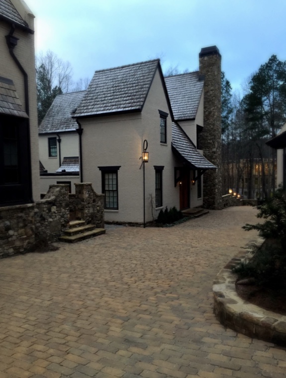 Homes define the edge of the path, a rare design in North America.