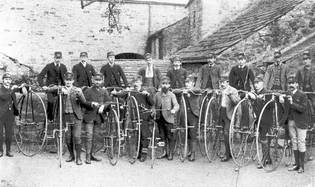 Group of men on high wheels.jpg