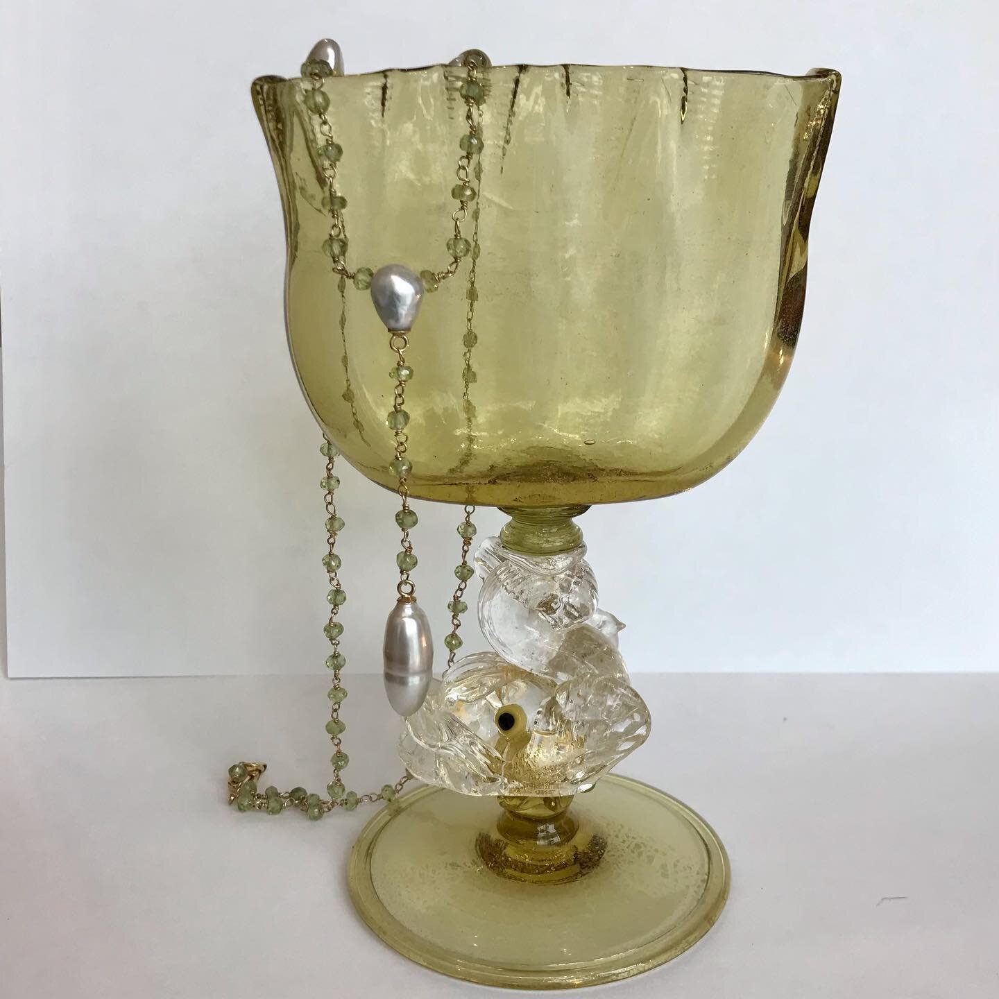 Freshwater pearls, peridot and 14k gold. Loving this combination for spring. Bonus points for anyone who knows what the glass vessel was intended to hold!!