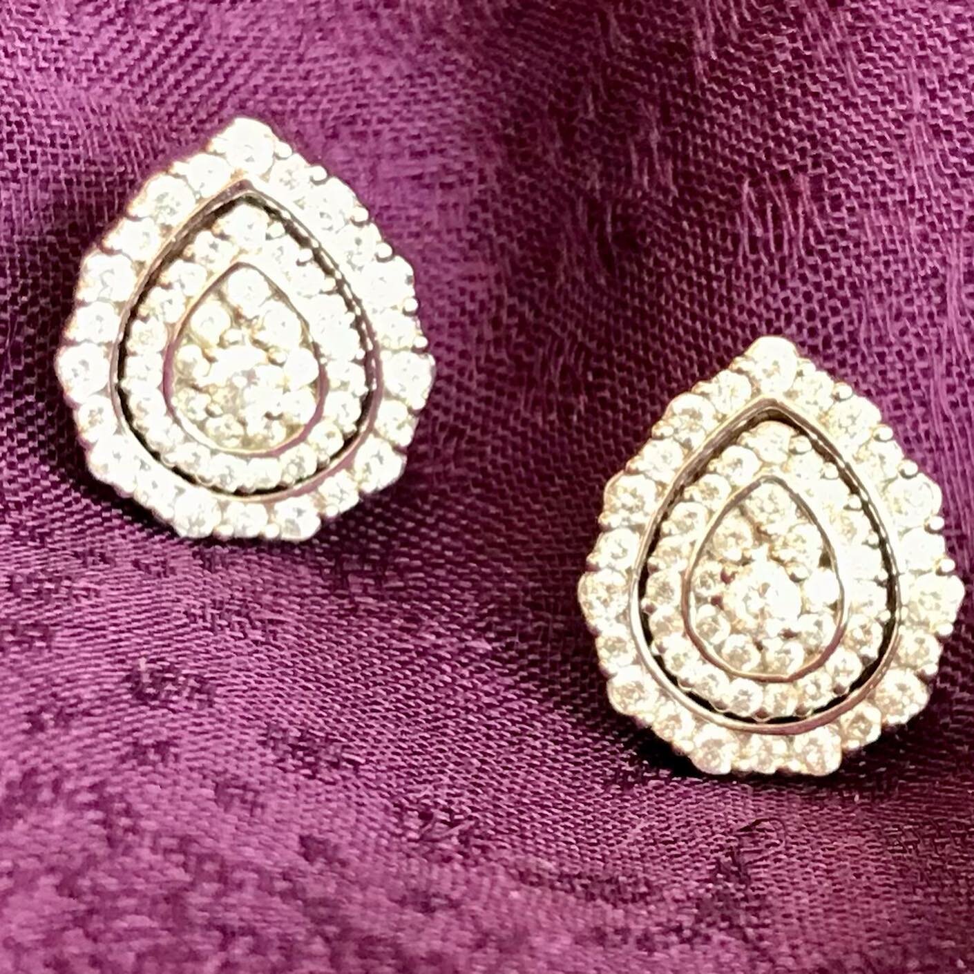 One pair of earrings to wear in three different ways! .75 tcw diamonds in 14k white gold.