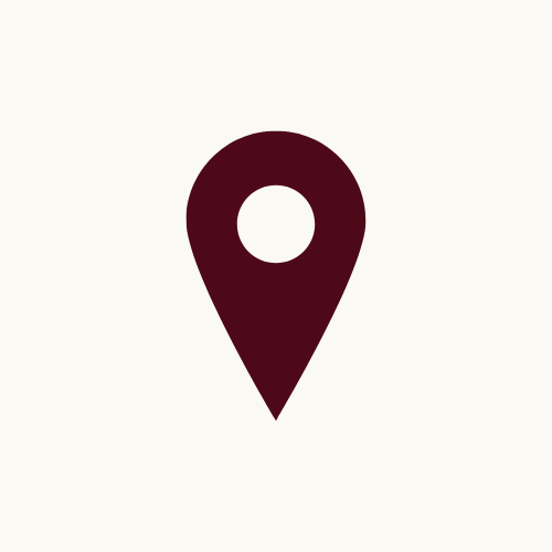 Simple map pin icon on a plain light background.