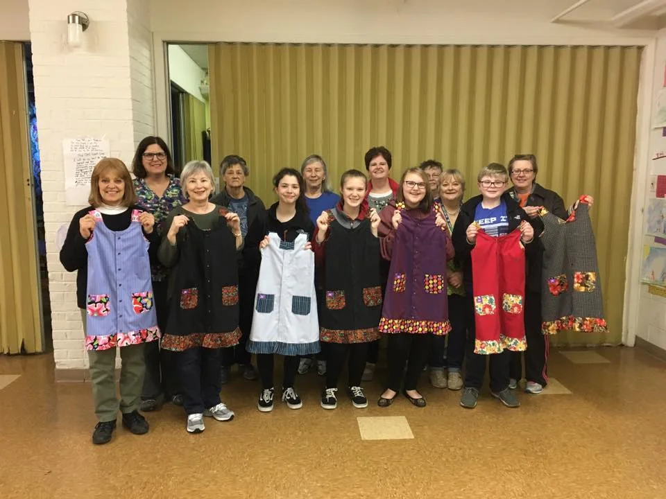 Dress-A-Girl volunteers.