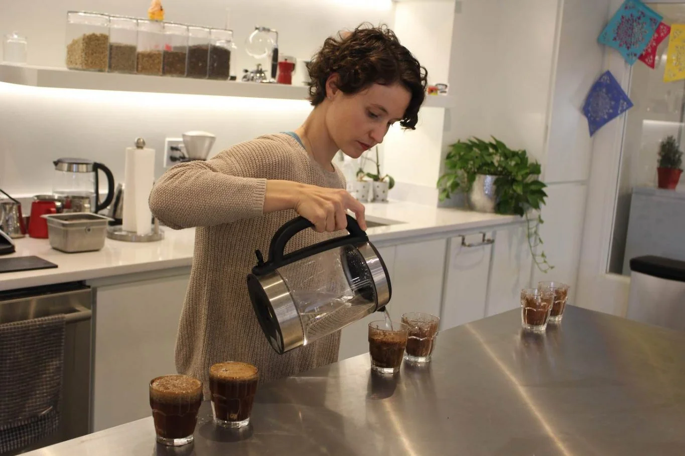 Rachel Langer prepares a cupping of three Red Rock coffees.jpg