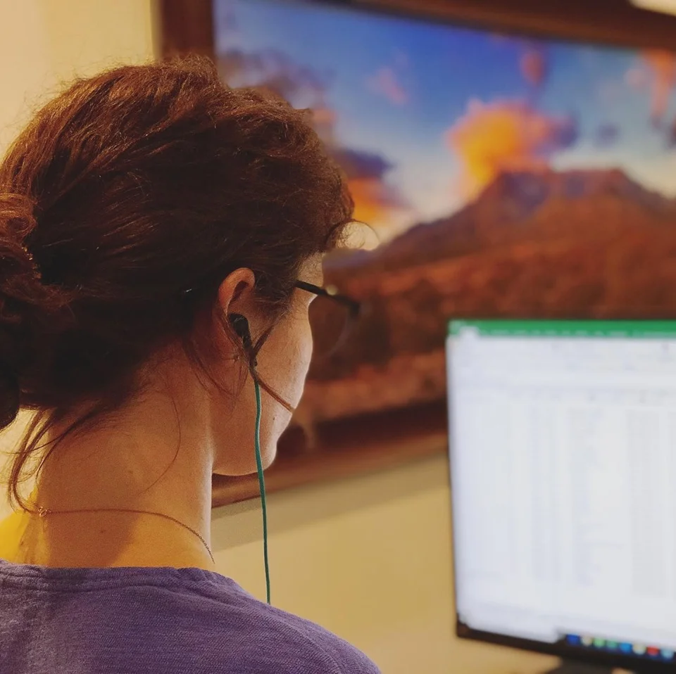 Yours truly working on a Fair Trade purchases report. Spreadsheets, site plans, inspections, and audits ensure compliance in third-party-audited schemes.