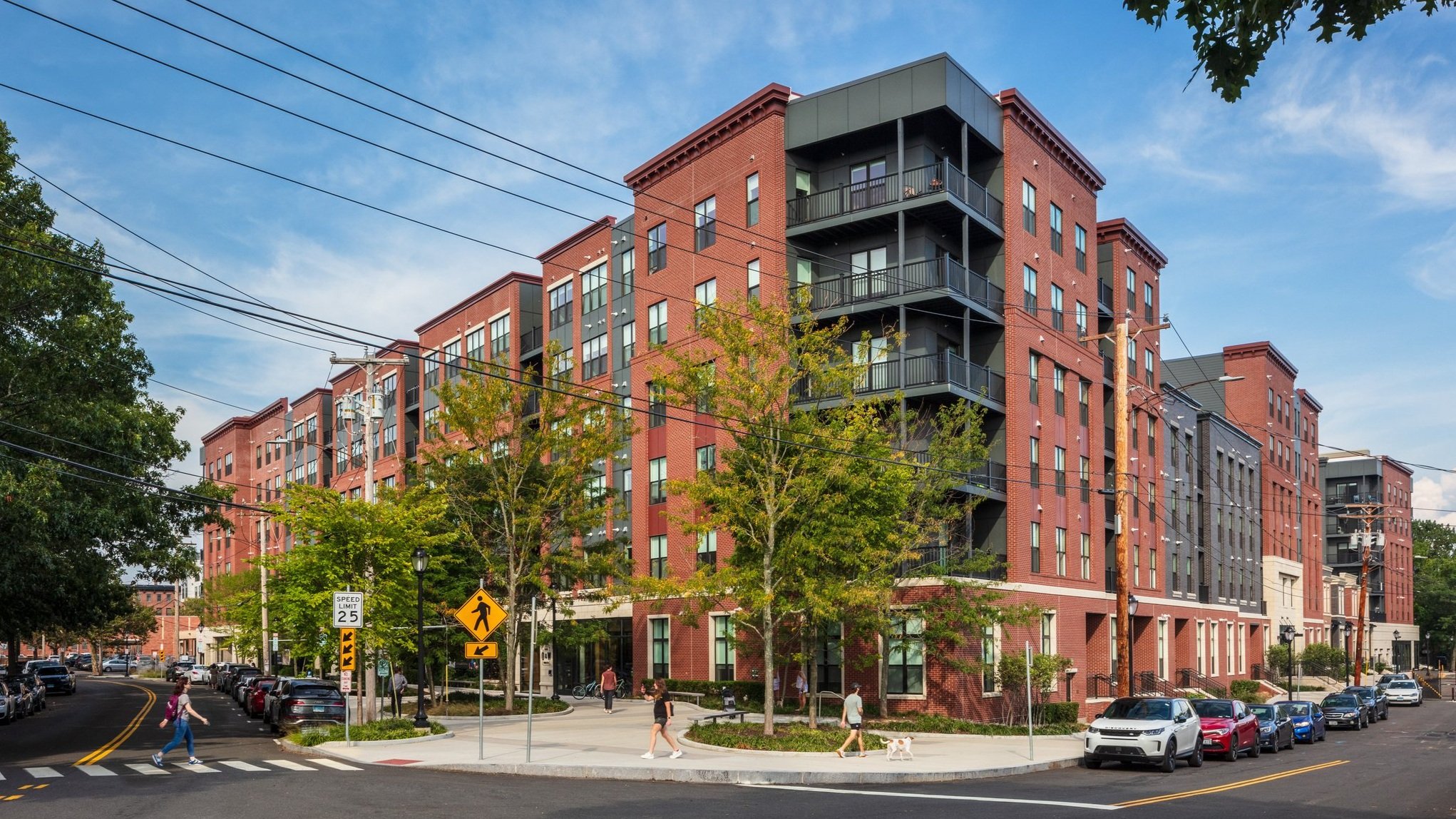 A pedestrian walks through Town Brookhaven, a mixed-use