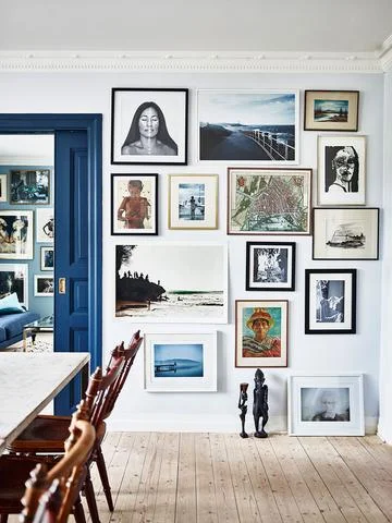 modern gallery wall inspiration via Domino