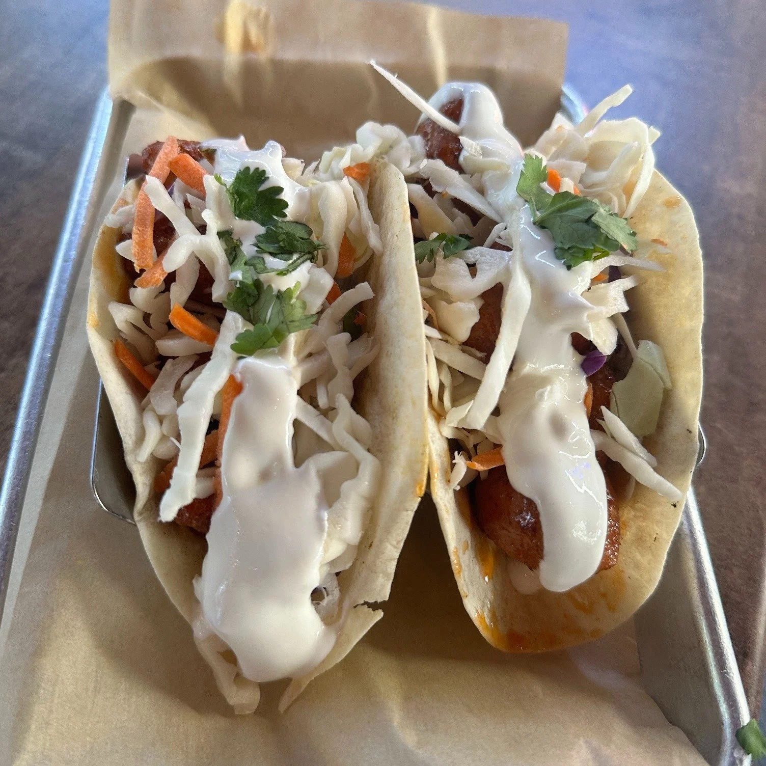 🌮🚨 NEW TACO ALERT! 🚨🌮

Chef&rsquo;s been playing around again&hellip; and this one is GOOD. 🤤

Introducing our Honey Sriracha Crispy Cauliflower Taco! 🔥🌮

Crispy cauliflower tossed in Honey Sriracha, topped with shredded cabbage &amp; carrots,