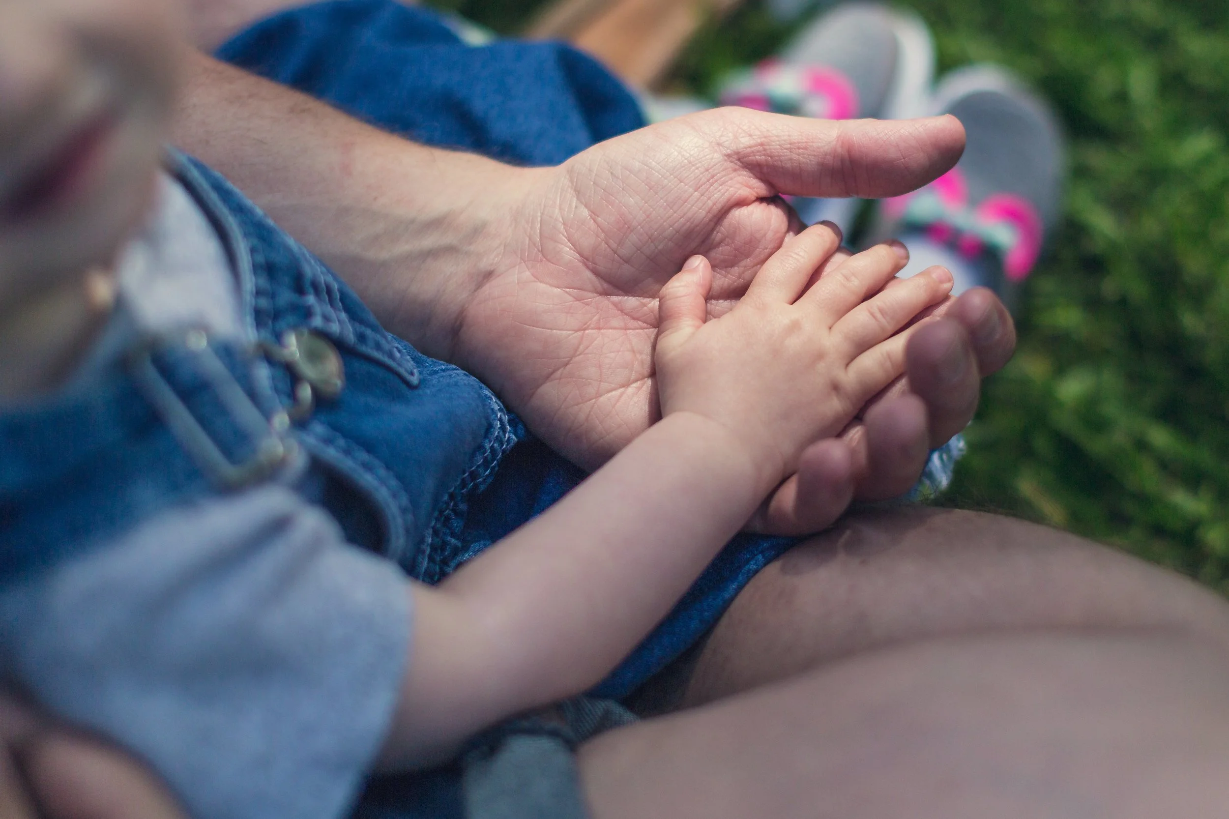 baby-and-father-hands_4460x4460.jpg