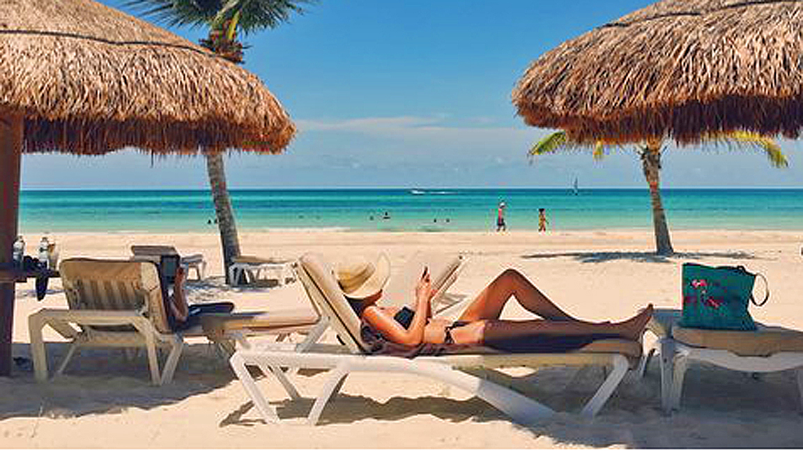 rietparasols tropical beach reading.jpg