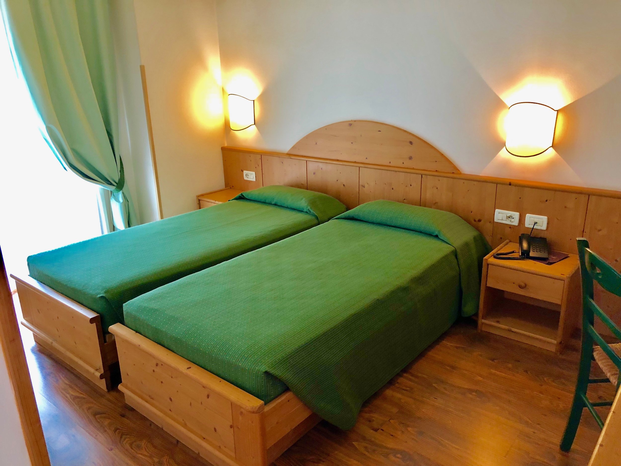 Clean, comfortable rooms at the Hotel Relais (Relax)