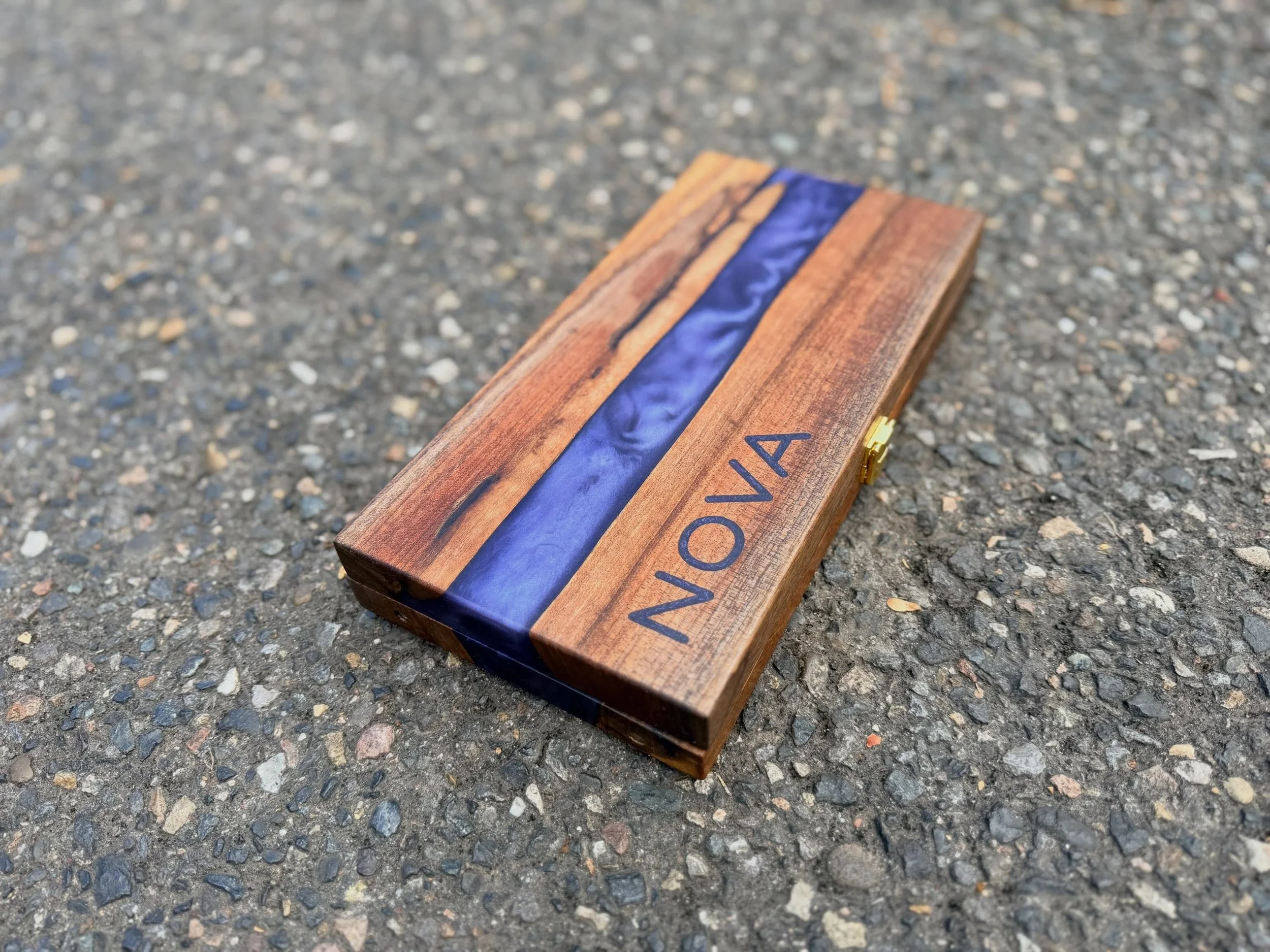 Custom Travel Mancala board. Resin pieces, solid live edge Walnut, magnetic connection for game board and clasps to close up for storage and travel. Who remembers this game?