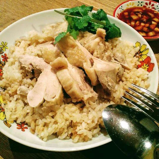 Khao man gai Rice cooked w/ chicken bouillon soup & chicken on top