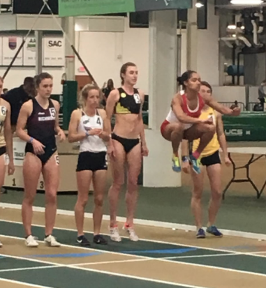 Pre Mile race- attempting to replicate the girl beside me. My “ups” are NOT what they used to be…