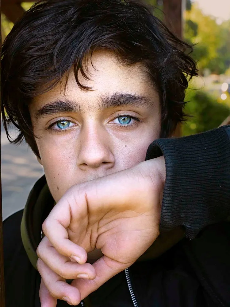 teenage French boy with Intense blue eyes