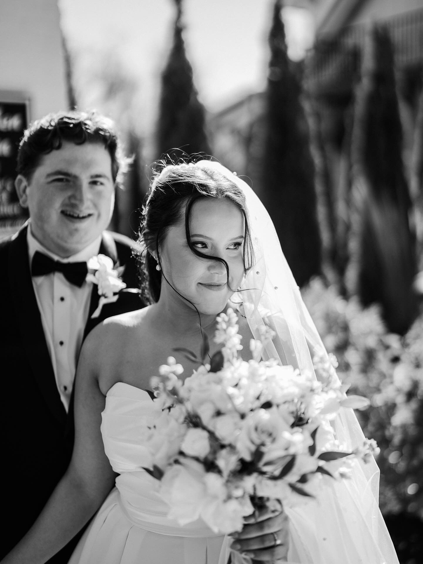 This dreary weather calls for a cute sunny wedding photo. Which funny story, their engagement session was a bit rainy but their wedding was so sunny and perfect! Love the difference and a couple willing to roll with the punches.