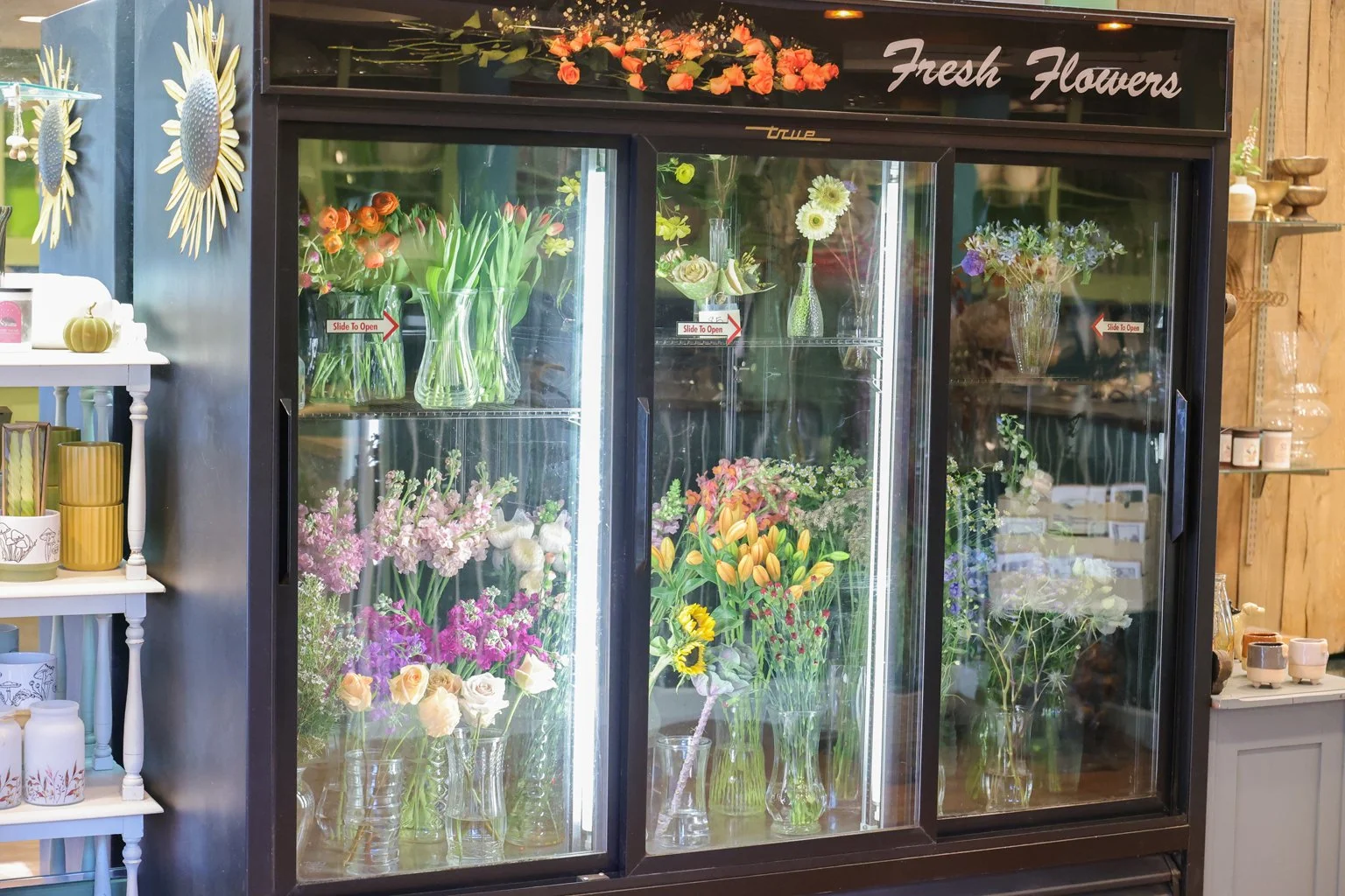 A New Leaf in Newport, Kentucky keeps a cooler stocked in the retail section. Lots of fresh flowers in every color of the rainbow including, sunflowers, lilies, gerber daisies, roses, snap drag, stock, thistle, ranunculus, etc.