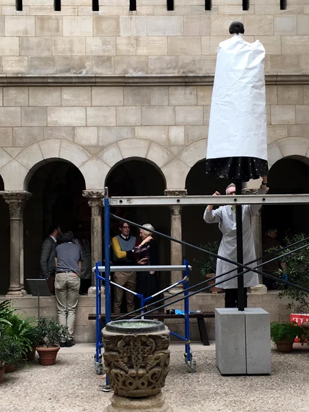 Installation in progress of Heavenly Bodies: Fasion and the Catholic Imagination at The Met Cloisters