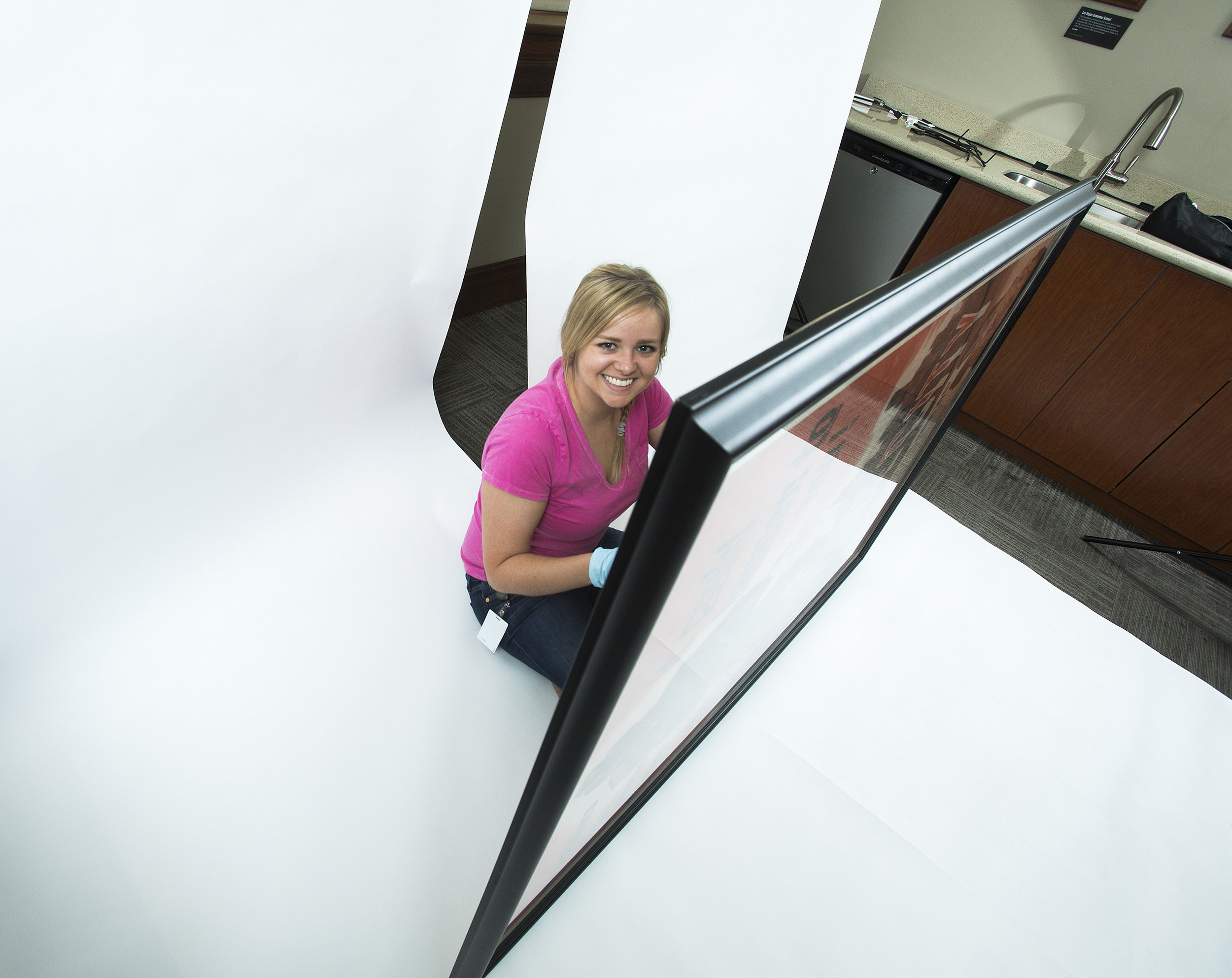 Shae Cox intern's at the Mob Museum and assists during a photoshoot for the Content Department. 
