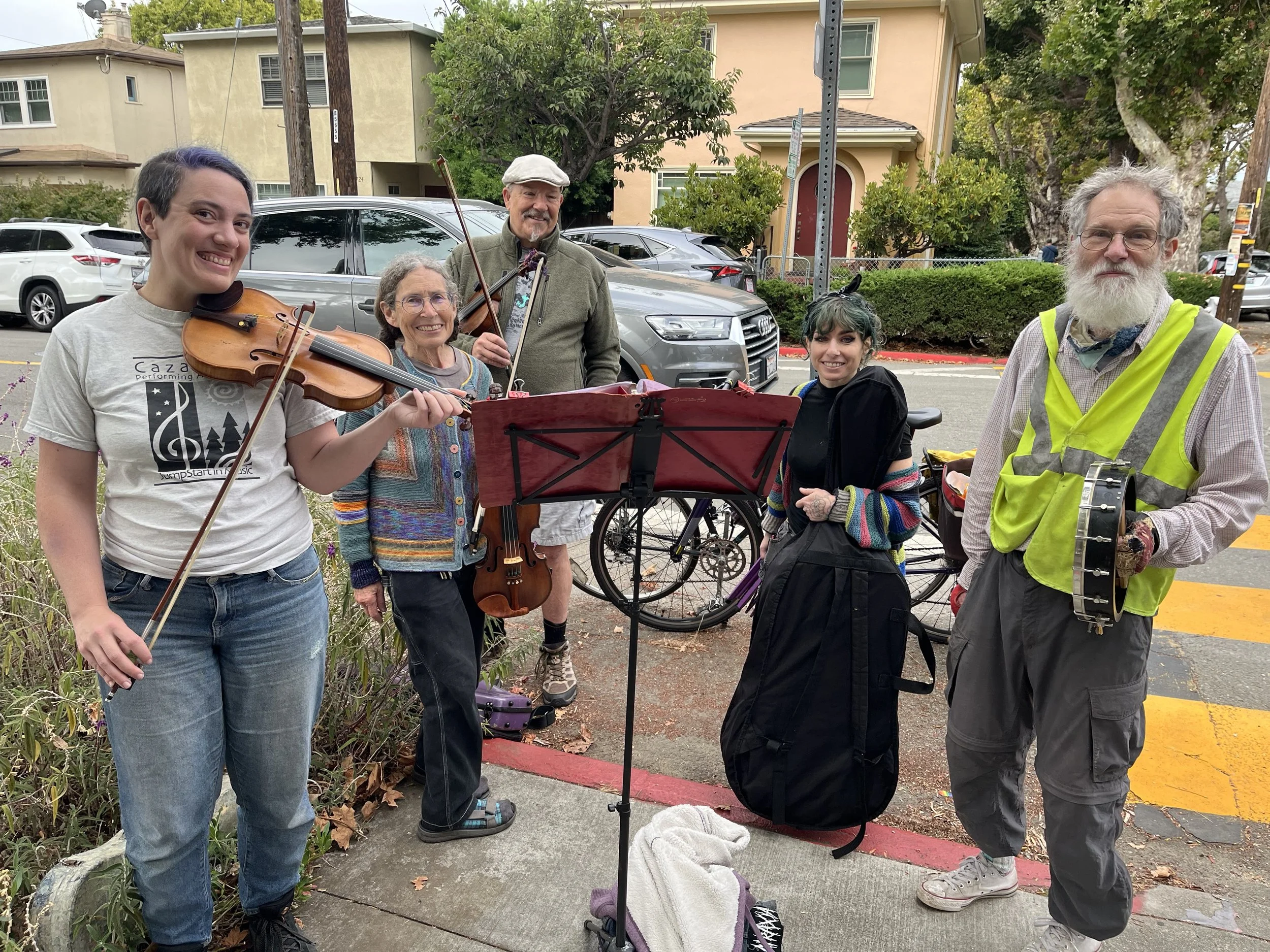 Mr. Bob's family and friends playing music to welcome students for new school year