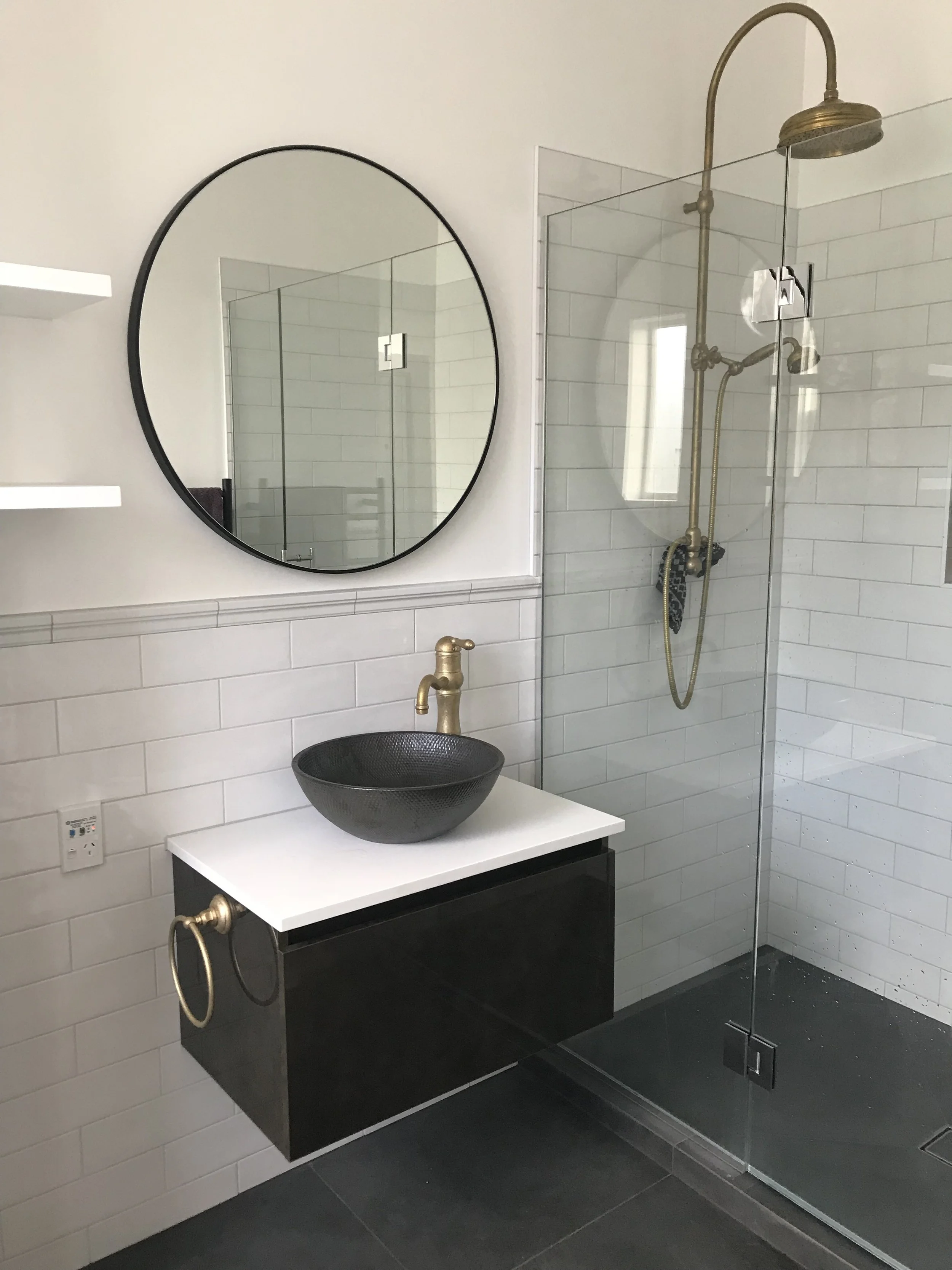 BATHROOM RENOVATION  Features: &nbsp;Subway Tiles, Brass Tapware, Brass Waterfall Showered, Raised Vanity and Bowl Style Basin.