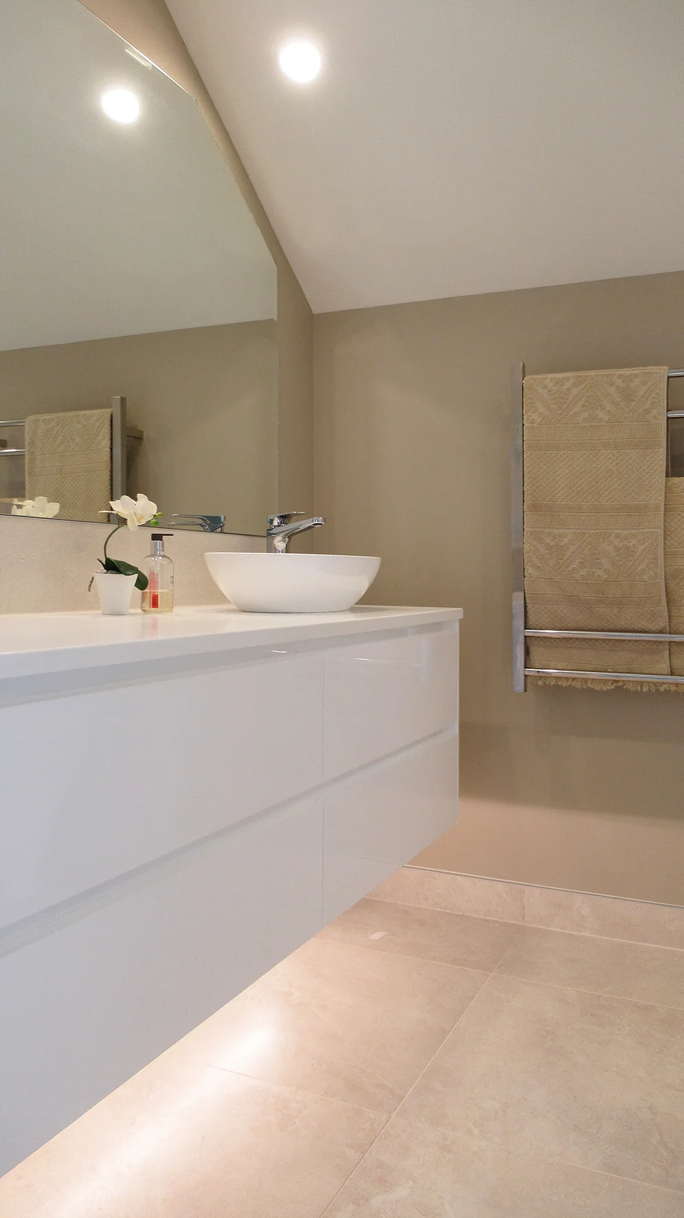 BATHROOM RENOVATION  Features: Floating Vanity, Under Vanity Lighting, Shower and Bath