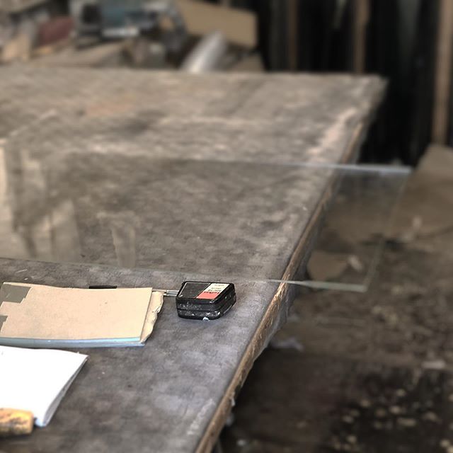 Out of the rain today In our Winchcombe workshop. We’ve been cutting sheet blown Georgian glass imported from France to fit our doors we are currently restoring. With only a very few places left in Europe that still produce this traditional material they use the same machine they’ve used since 1850! It takes a steady hand and deep breath to shape and install this beautiful product. #glass #glazing #restoration #decorators #interiors #Georgian #traditonal #